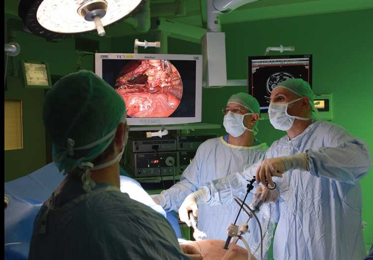 Doctors perform surgery
