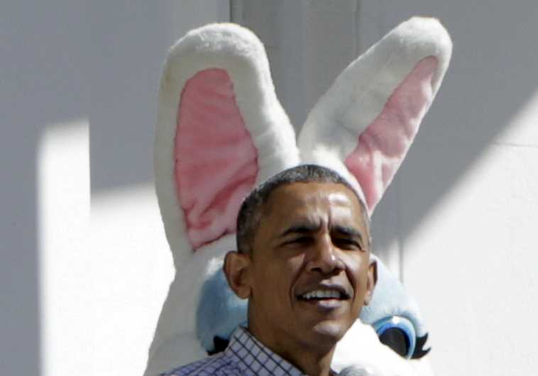 U.S. President Barack Obama greets participants before the annual White House Easter Egg Roll in Washington 
