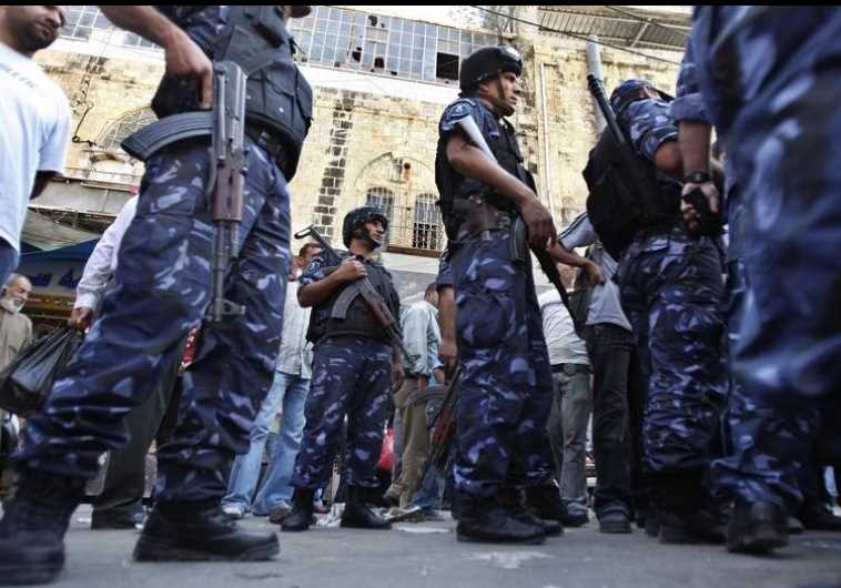 Palestinian Authority police officers stand guard in the West Bank [File]