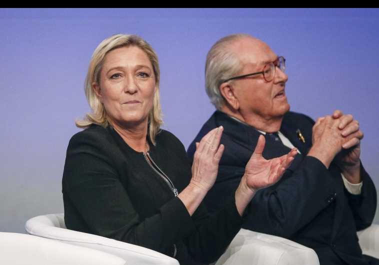 Marine Le Pen (L), France's National Front political party leader, sits next to her father Jean-Marie Le Pen [File]
