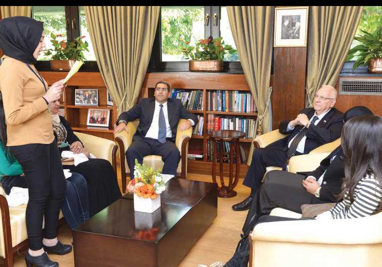 Rivlin meets with Arab volunteers in national civil service at his residence in Jerusalem earlier this month.
