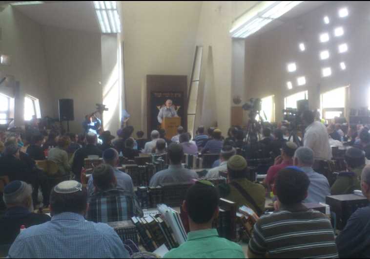Mourners attend a funeral service for Rabbi Aharon Lichtenstein