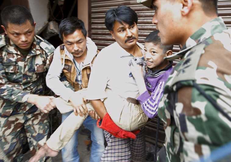 Boy rescued from collapsed house after Nepal earthquake 
