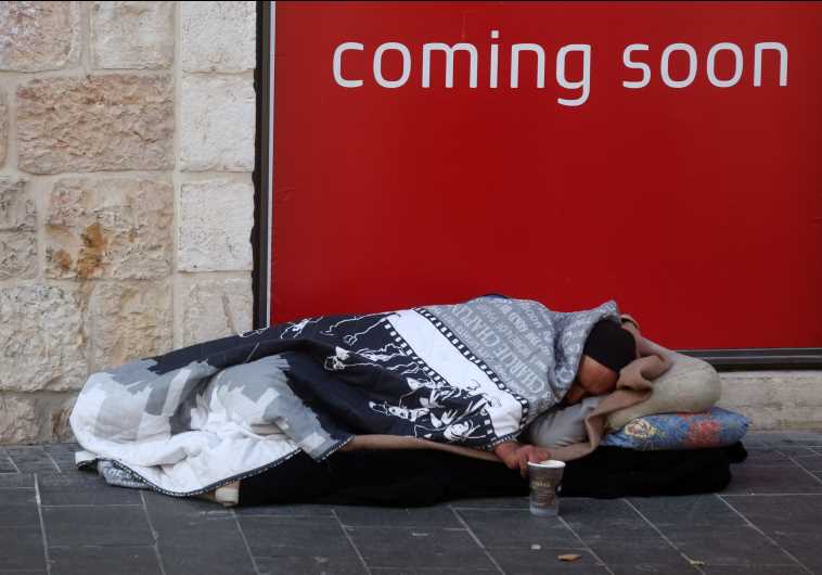 Homeless person on Jaffa Street in Jerusalem.