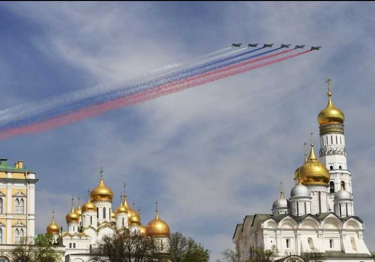 Russian Sukhoi Su-25 Frogfoot ground-attack planes fly in formation over the Red Square during the Victory Day parade in Moscow