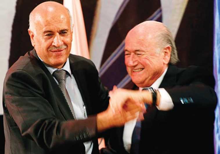 Palestinian Football Association President Jibril Rajoub (L) and FIFA President Sepp Blatter