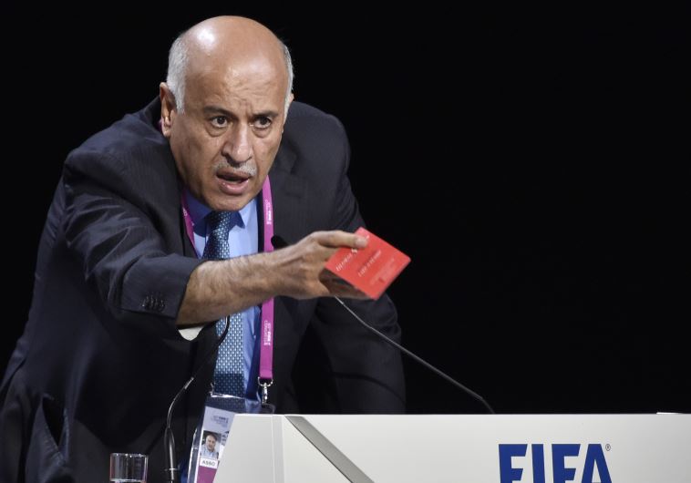 President of the Palestinian FA Jibril Rajoub shows a red card as he speaks during the 65th FIFA Congress on May 29, 2015 in Zurich.