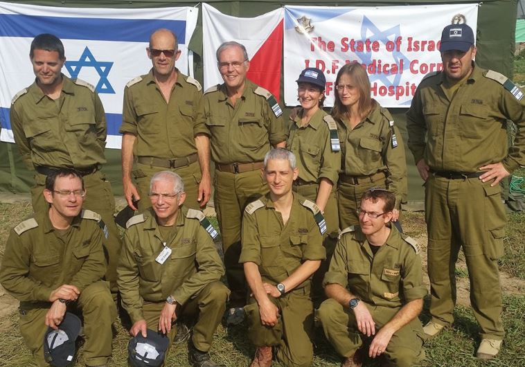 Dr. Ofer Merin (top, second from left) and Prof. Jonathan Halevy next to him; Prof. Amos Peyser (bottom row, second from left) 