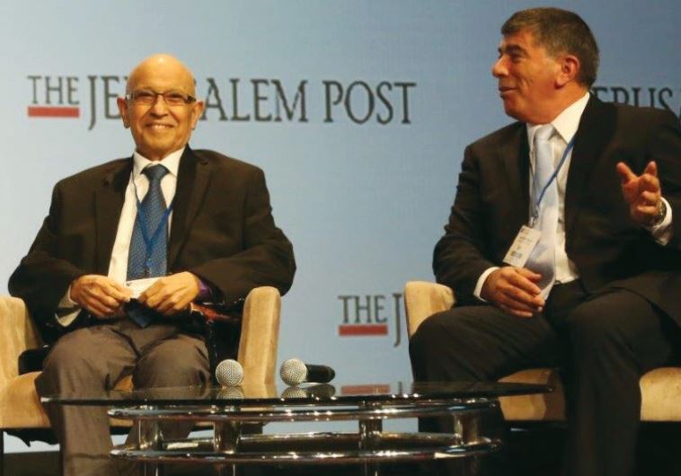 FORMER IDF chief of staff Gabi Ashkenazi gestures beside former Mossad chief Meir Dagan at 'The Jerusalem Post' Conference in New York.
