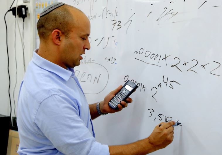 Education Minister Naftali Bennett teaching math to students in Petah Tikva, May 28.