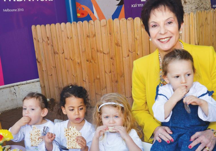 RIVKA LAZOVSKY, chairwoman of the World WIZO Executive, enjoys herself at a WIZO daycare center on King George Street in Tel Aviv.