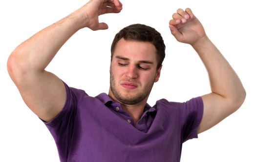 Man with Hyperhidrosis sweating very badly under armpit