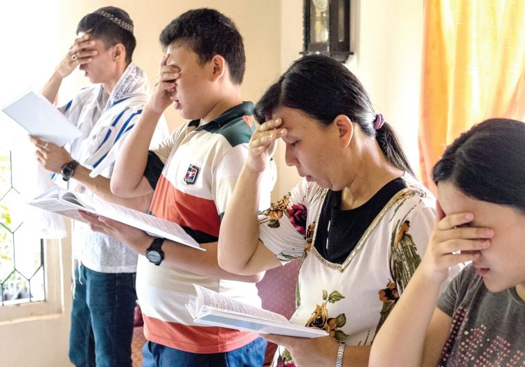 Indonesian Jews reciting the Shema prayer during Saturday morning services.