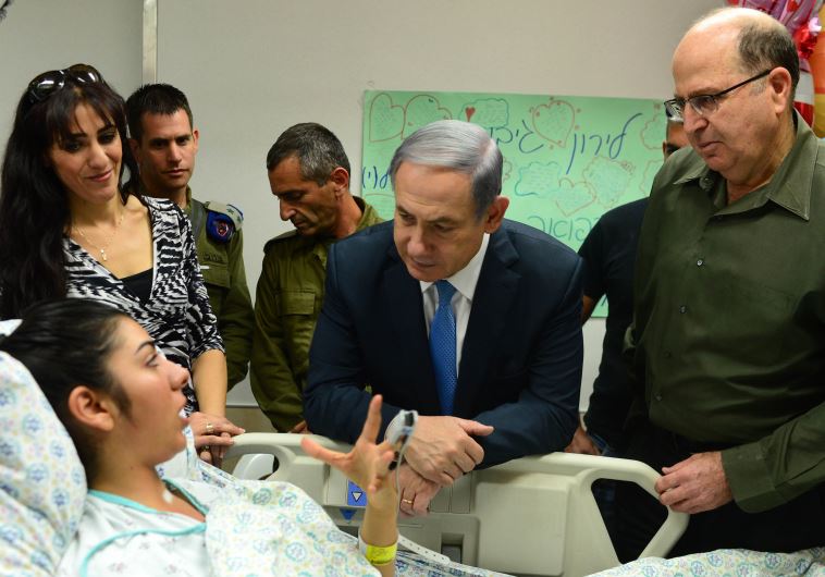 Netanyahu and Ya'alon visit terrorist victims
