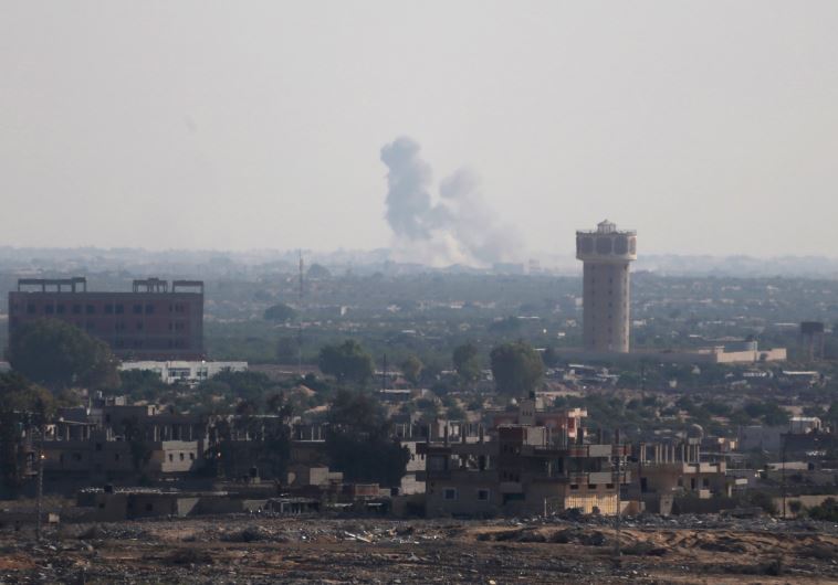 Smoke rises in Egypt's North Sinai as seen from the border of southern Gaza Strip with Egypt July 1, 2015. 