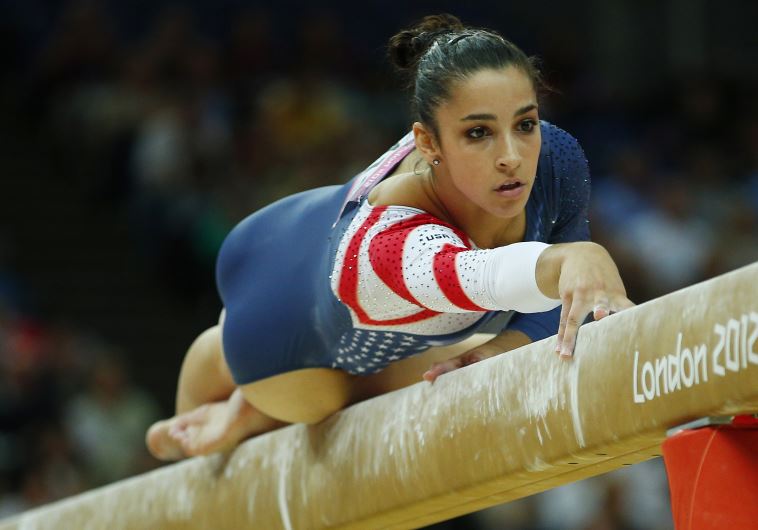 Alexandra Raisman of the US competes in the women's gymnastics balance beam final in the North Greenwich Arena during the London 2012 Olympic Games
