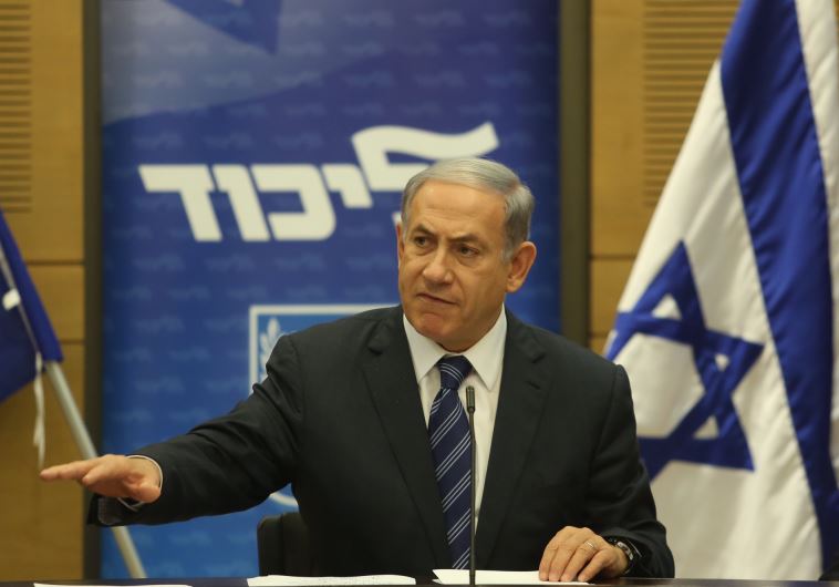 Prime Minister Benjamin Netanyahu gestures during an appearance at a Likud faction meeting