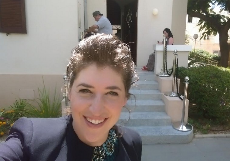 Mayim Bialik outside house of relative and poet Hayim Bialik 