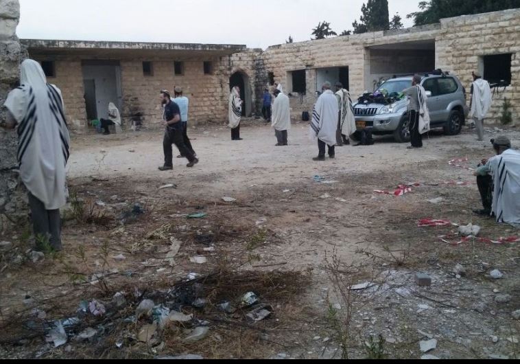 Activists that have returned to ruins of Sa-Nur  settlement in Samaria which was razed during 2005 disengagement