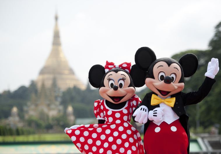 Walt Disney characters Mickey Mouse (R) and Minnie Mouse.