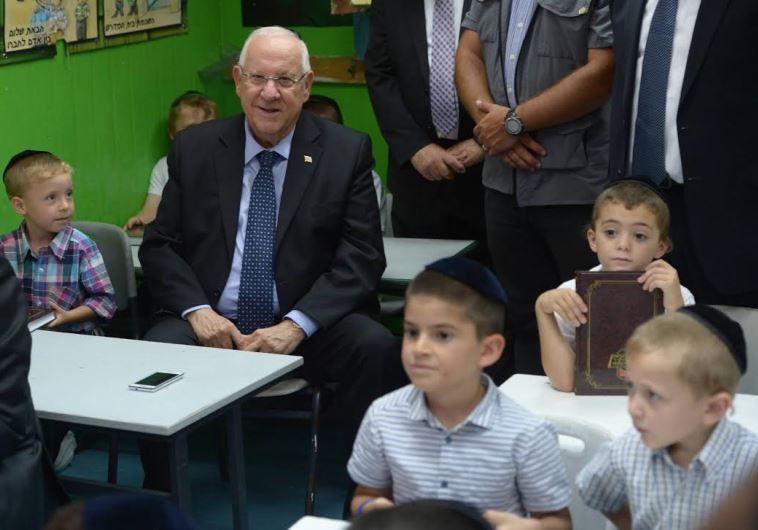 Rivlin at Haredi school in Jerusalem, August 16, 2015