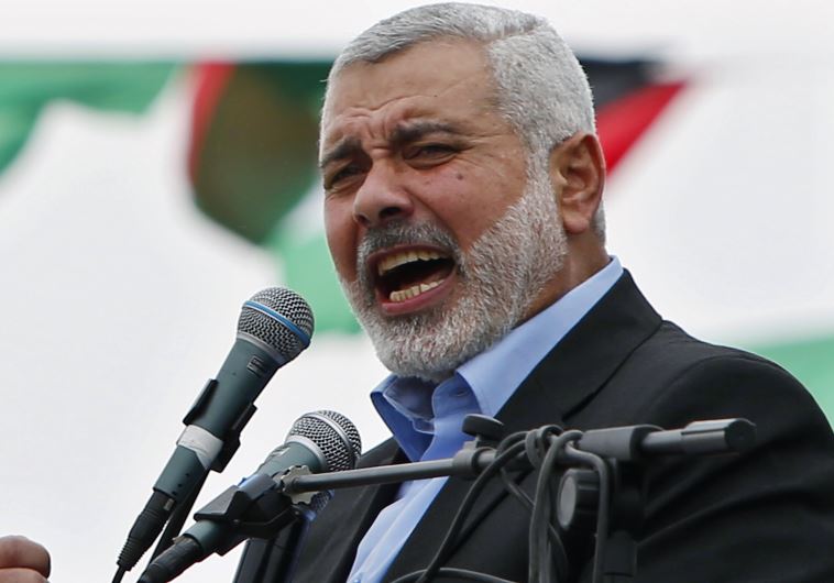Ismail Haniyeh talks to his supporters during a Hamas rally in Gaza City