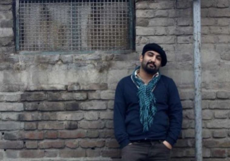 Kouhyar Goudarzi standing near Tehran’s Evin Prison where he was imprisoned for 10 months