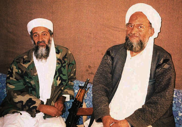 al-Qaida cheif Ayman al-Zawahiri sits with predecessor Osama Bin Laden during an interview in 2001 
