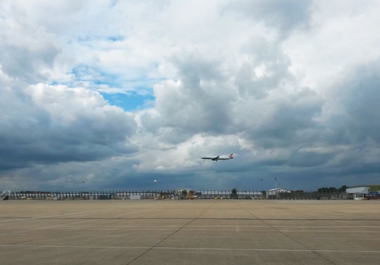 A BRITISH AIRWAYS flight lands at Heathrow Airport
