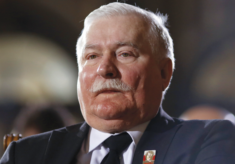 Lech Walesa attends a church service to commemorate former German President Richard von Weizsaecker in Berlin February 11, 2015.