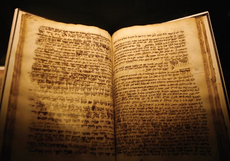 AN ANCIENT Hebrew text is displayed at a museum. Was the patriarch Abraham one of the first Jewish lawyers, wonders the author.