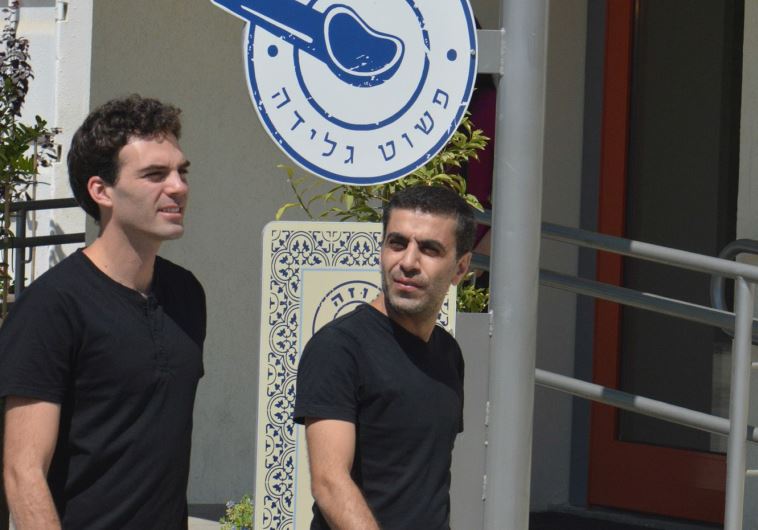 Founders Adam Ziv (left) and Alaa Sweetat at the Buza shop and production center at Kibbutz Sasa