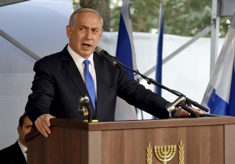 Prime Minister Benjamin Netanyahu delivers a speech during a memorial ceremony for the late Yitzhak Rabin at Mount Herzl military cemetery in Jerusalem