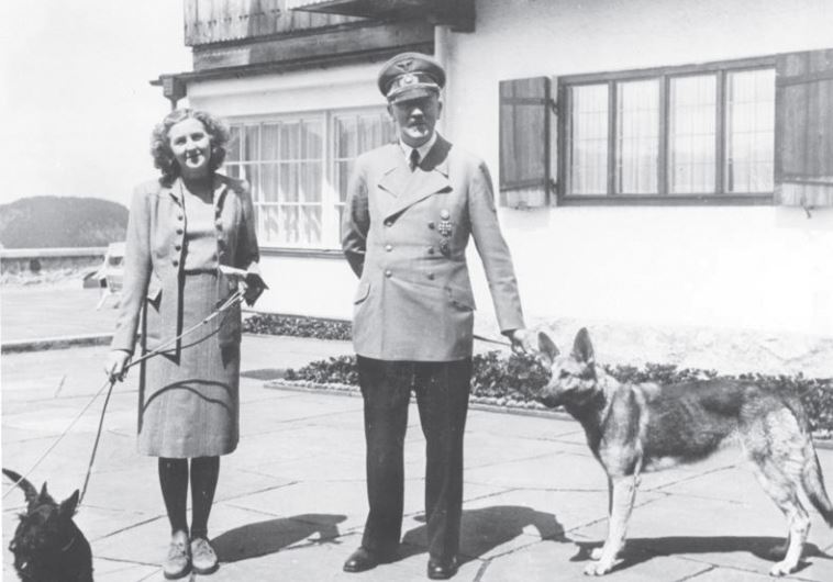 Adolf Hitler and Eva Braun with their dogs at the Berghof, his home in the Bavarian Alps