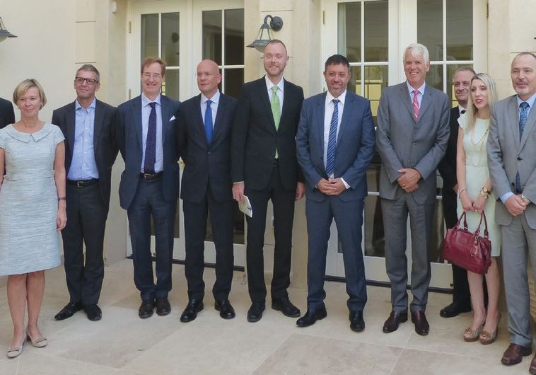 Environmental Protection Minister Avi Gabbay (center) meets with EU Ambassador to Israel Lars Faaborg-Andersen and other ambassadors of EU countries in Herzliya yesterday to address climate change