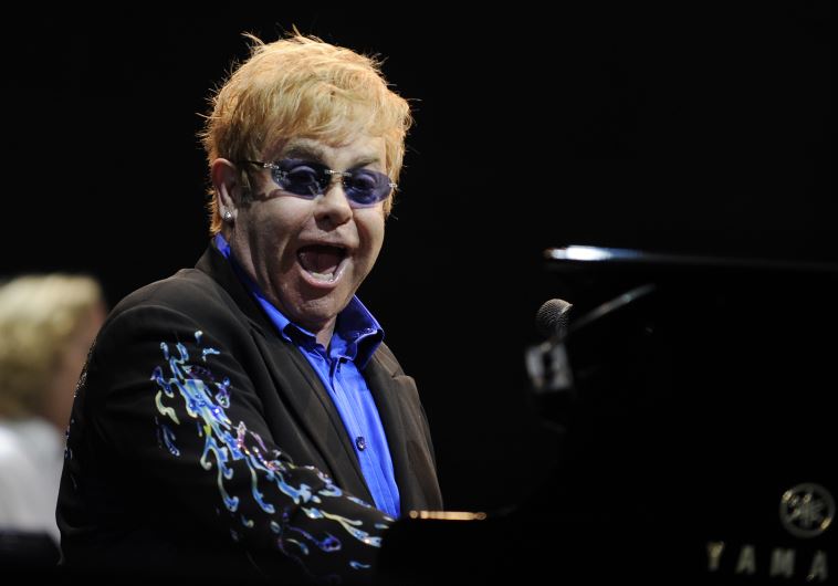 British singer Elton John performs during a concert in Tel Aviv June 17, 2010
