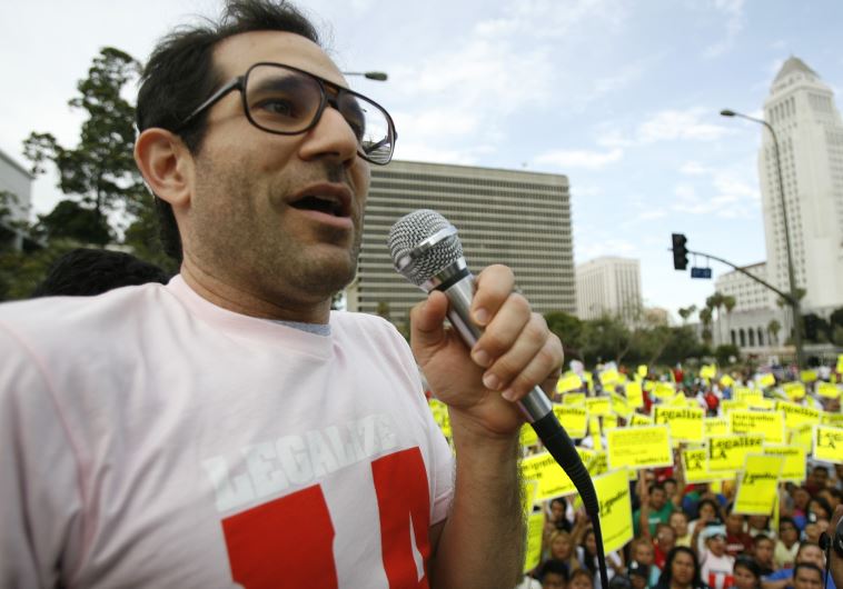American Apparel owner Dov Charney speaks during a May Day rally protest march for immigrant rights, in downtown Los Angeles May 1, 2009.