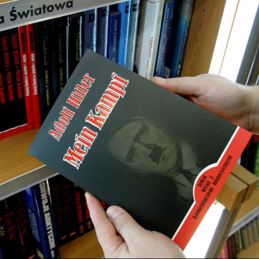 A customer holds a Polish copy of Adolf Hitler's Mein Kampf at a book store in Wroclaw, south western Poland February 23, 2005