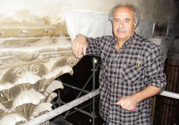 Akram Anastas next to his duplicate of a fourth-century Byzantine capital found in Bethlehem’s Church of the Nativity, for a Norwegian church