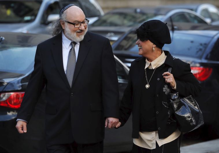 Convicted Israeli spy Jonathan Pollard departs US District court after a hearing with his wife Elaine in the Manhattan borough of New York December 14, 2015.