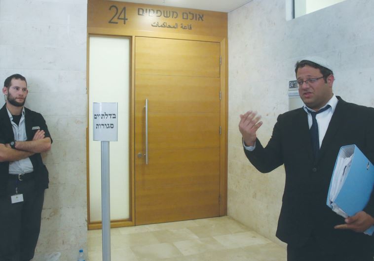 ATTORNEY ITAMAR BEN-GVIR, who is representing one of the suspects in the Duma terrorist attack, waits outside the Petah Tikva Magistrate’s Court