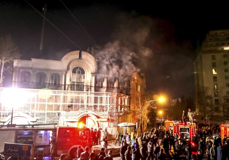 Flames rise from Saudi Arabia's embassy during a demonstration in Tehran January 2, 2016