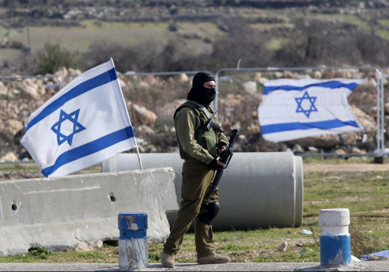 IDF soldier at West Bank checkpoint at Gush Etzion Junction.