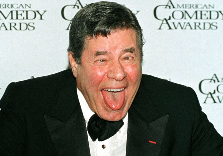 Comedian Jerry Lewis clowns around after receiving the Lifetime Achievement Award at the 12th annual American Comedy Awards, February 22, 1998, in Los Angeles 