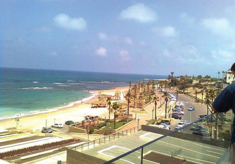 GIVAT ALIYA BEACH in Jaffa is seen from the balcony of the Peres Center for Peace