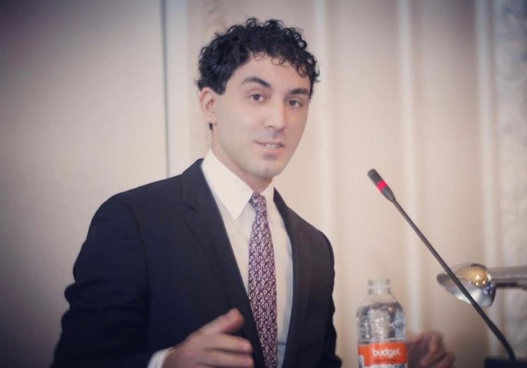 Jerusalem Post Washington bureau chief Michael Wilner delivering an address on the Syrian crisis in Denmark's parliament, January 9, 2016