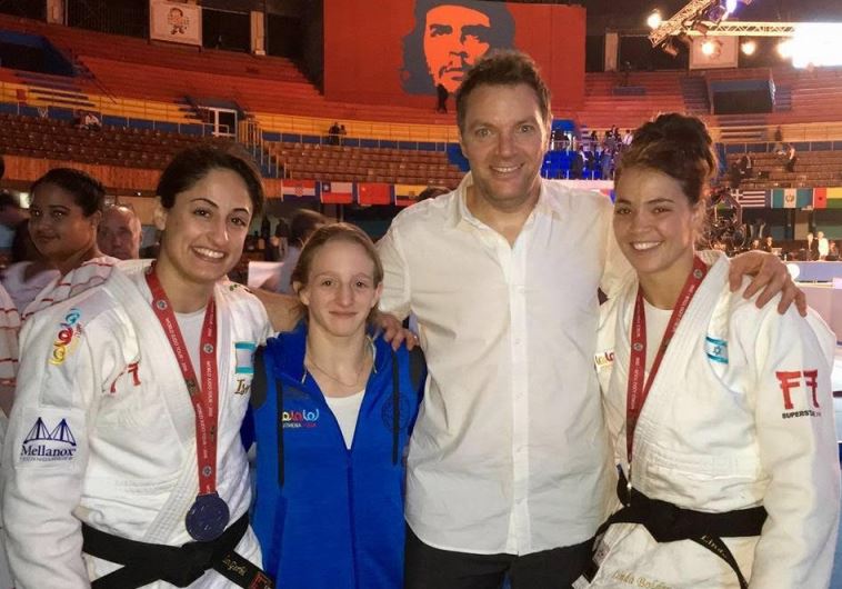 Israeli judokas Yarden Gerbi (L) and Linda Bolder (R) both won gold medals at the Grand Prix of Havana in Cuba on January 23, 2016, while Shira Rishony (2nd L) claimed a silver the previous day. All three are guided by national team coach Shany Hershko (2nd R).