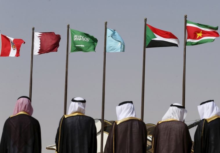 Saudi officials wait to receive leaders attending the Summit of South American-Arab Countries in Riyadh