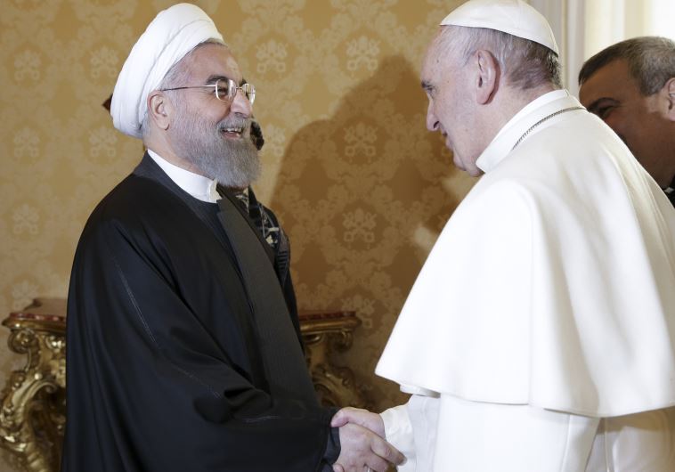 Iran's President Hassan Rouhani (L) is welcomed by Pope Francis at the Vatican January 26, 2016