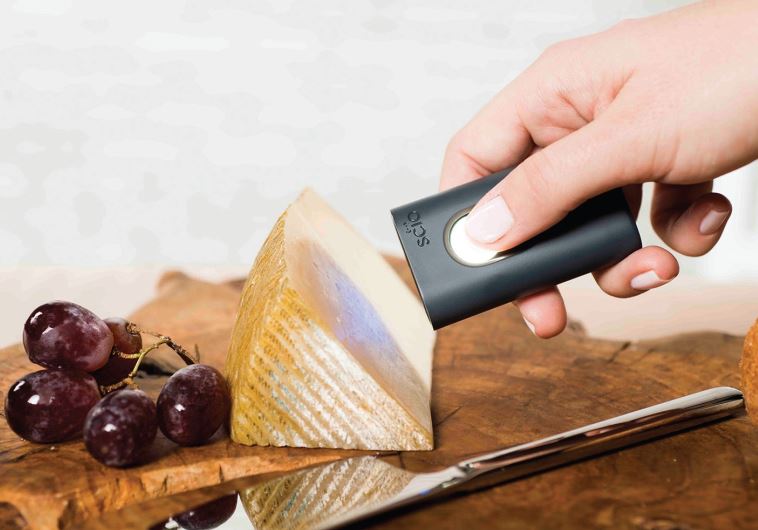 ConsumerPhysics' SCiO device scanning cheese